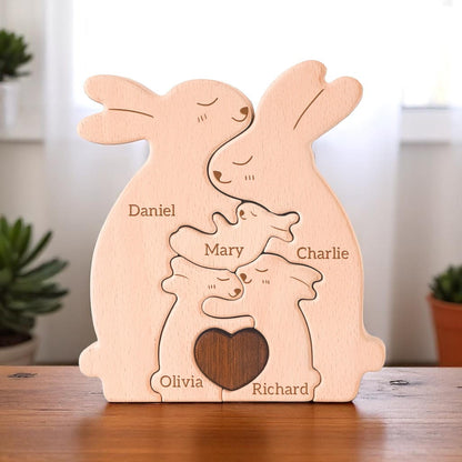Custom bunny family keepsake for family of five with personalised names on a wooden surface.