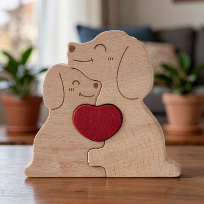 Wooden family puzzle of dog figurines with two pieces and a red heart, standing on a table with plants in the background, All names are custom engraved for the family member names.