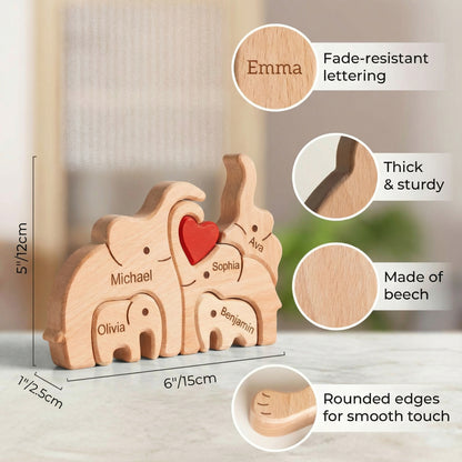 Size guide for a wooden elephant family puzzle with engraved names. The puzzle features a red heart and is made of light-coloured wood. A unique and personalised gift. The family members names are all engraved beautiful, very thoughtful gift for mum, dad, moving out or any other special occasion.
