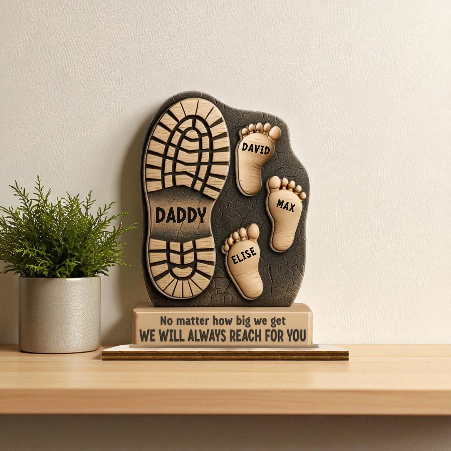 Handmade dad footprint keepsake showing three kids with engraving
