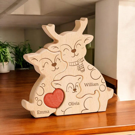 Handmade deer family keepsake for trio of family members with engraving
on a wooden surface
