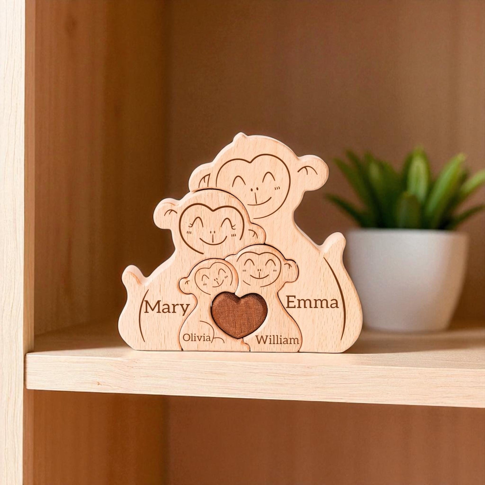 Handmade monkey family keepsake in premium pine wood for home decor on a wood shelf