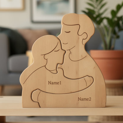 Wooden hugging family puzzle with personalised engraved names, two member family in premium beech wood on a shelf.