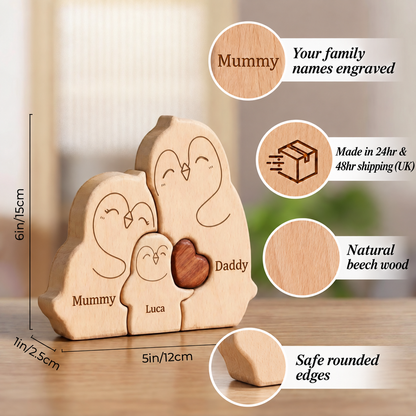 MyFamilyPuzzle personalised penguin family puzzle size guide, showing three solid beech wood penguins engraved Mummy, Daddy and Luca with a brown wooden heart. Measurements: 6in/15cm high, 5in/12cm wide and 1in/2.5cm thick. Close-ups show engraved family names, natural beech wood and safe rounded edges, alongside UK delivery information. A wooden family keepsake for a new mum gift, new baby gift or baby shower gift.