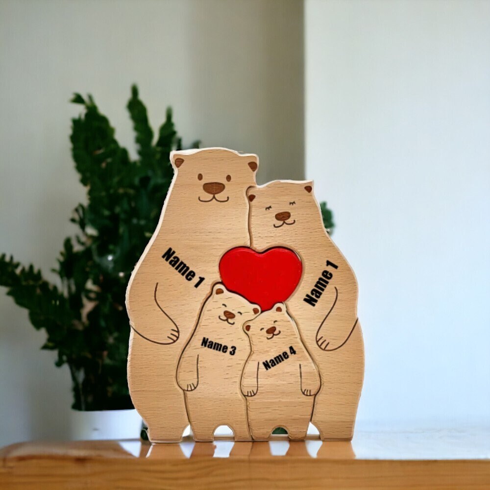 Personalised bear family wooden ornament for 4 people with custom engraved names on a shelf with a light background.