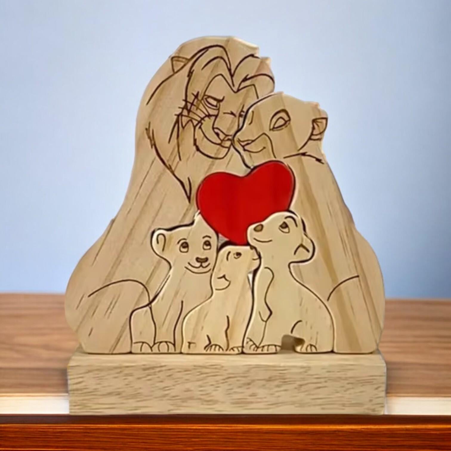 Personalised lion family wooden puzzle five piece family keepsake gift set on a wood shelf
