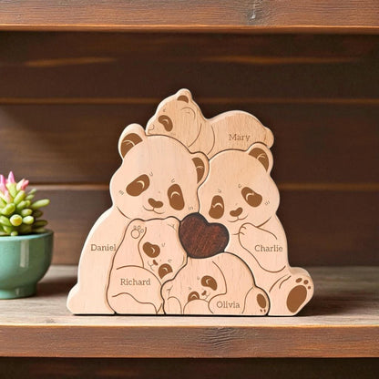 Personalised panda family puzzle for five member family with custom names
on a wooden shelf.