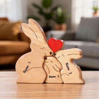 Personalised wooden rabbit family figurine with engraved names of the family members and heart detail, a meaningful family keepsake and custom gift for parents, children, anniversaries, or home décor. Family of 3.