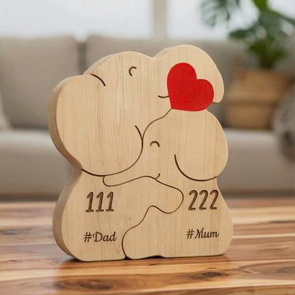 Personalized wooden elephant family for a couple, it is an elephant figurine with engraved names and heart detail, a meaningful family keepsake and custom gift for parents, children, anniversaries, or home décor.