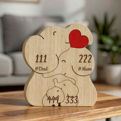 Personalised wooden elephant family puzzle for a family of 4 with engraved names and heart detail, a meaningful family keepsake and custom gift for parents, children, anniversaries, or home décor.