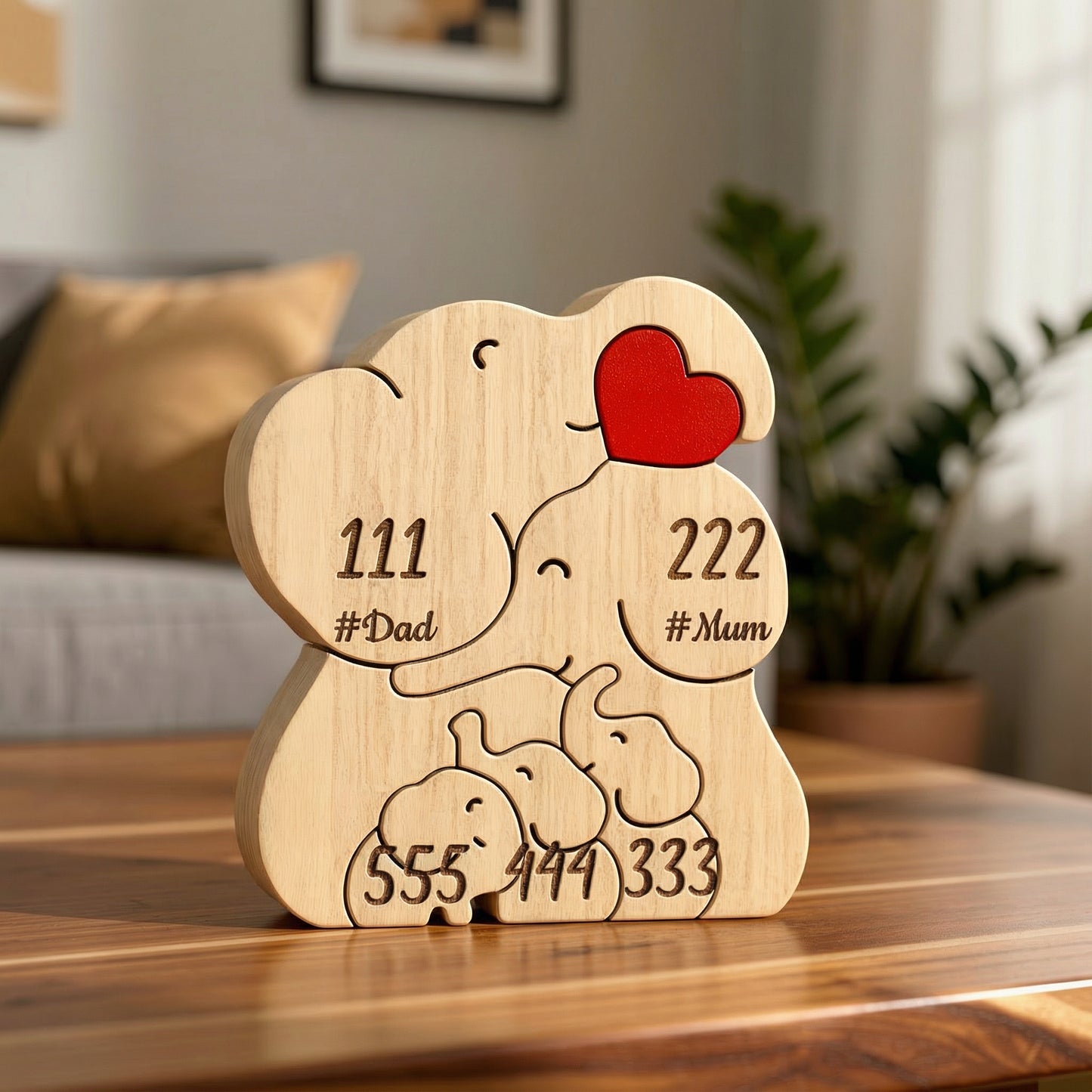 Personalized wooden elephant family figurine for a family of 5 with engraved names and heart detail, a meaningful family keepsake and custom gift for parents, children, anniversaries, or home décor.