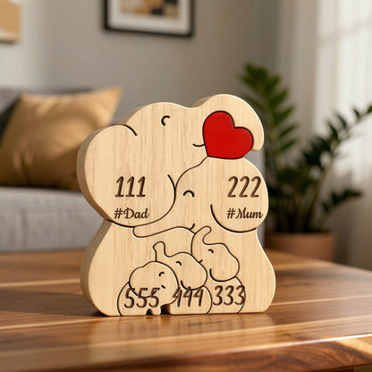 Personalized wooden elephant family figurine for a family of 5 with engraved names and heart detail, a meaningful family keepsake and custom gift for parents, children, anniversaries, or home décor.