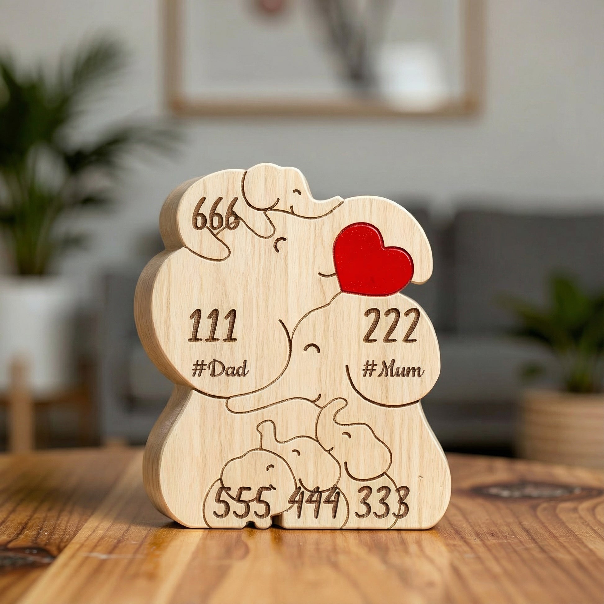 Personalized wooden elephant family figurine for a family of 6, with engraved names and heart detail, a meaningful family keepsake and custom gift for parents, children, anniversaries, or home décor.