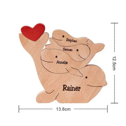 Wooden delphine family puzzle four member family in premium pine wood, on a white background with dimensions indicated.