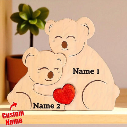 Wooden koala family puzzle two piece couple keepsake with custom names, on a neutral background.