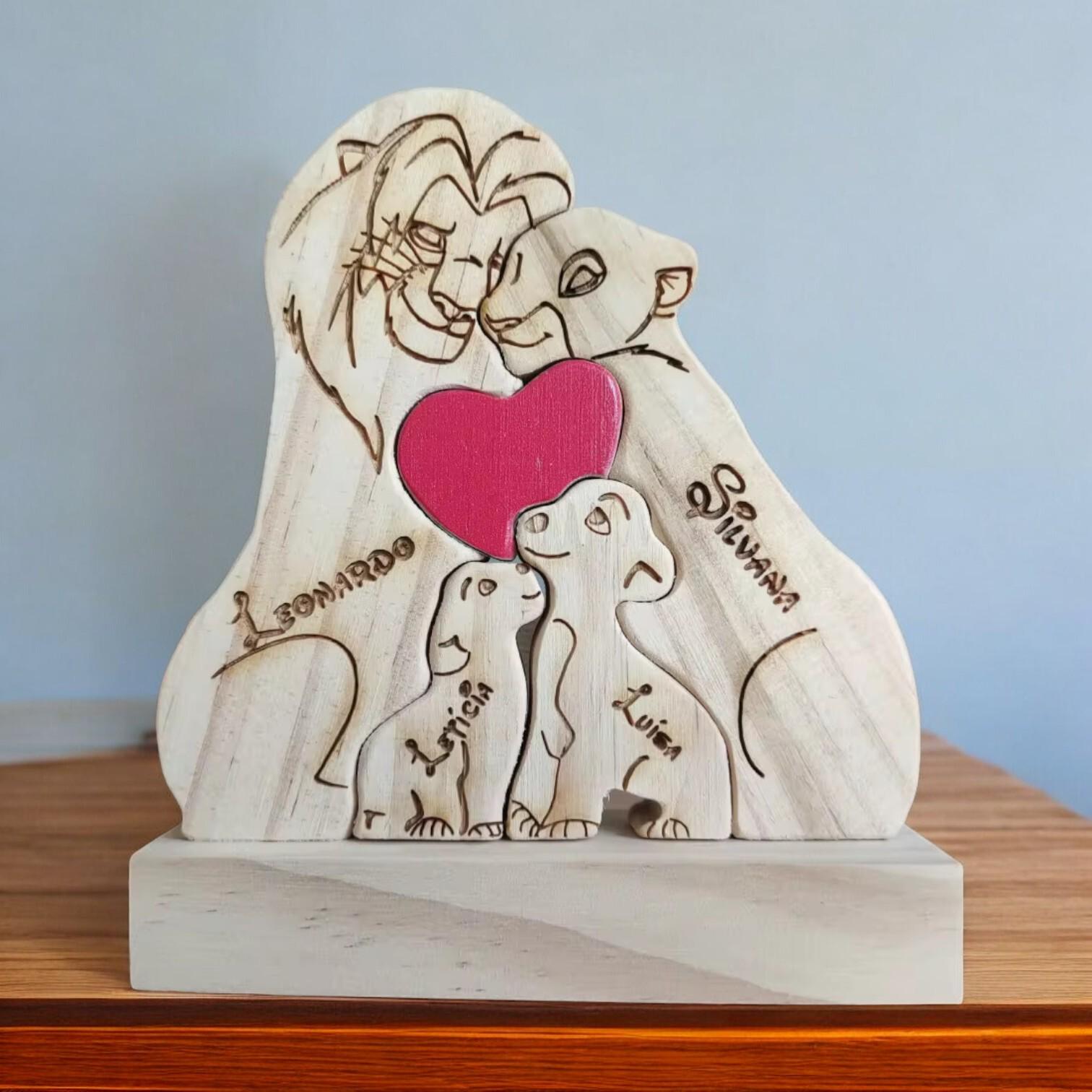 Wooden lion family puzzle four member family on a wooden base.