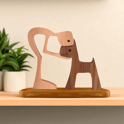 Wooden sculpture of a dog on a stand with a plant in the background