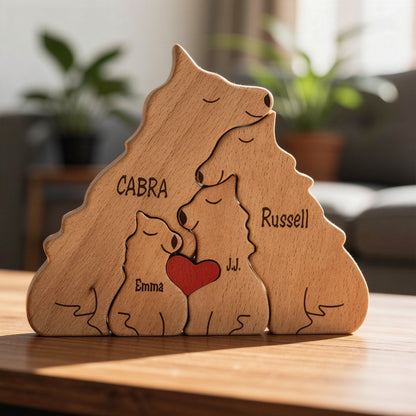 Wooden wolf family puzzle four piece family set in premium pine wood, on a wooden surface.