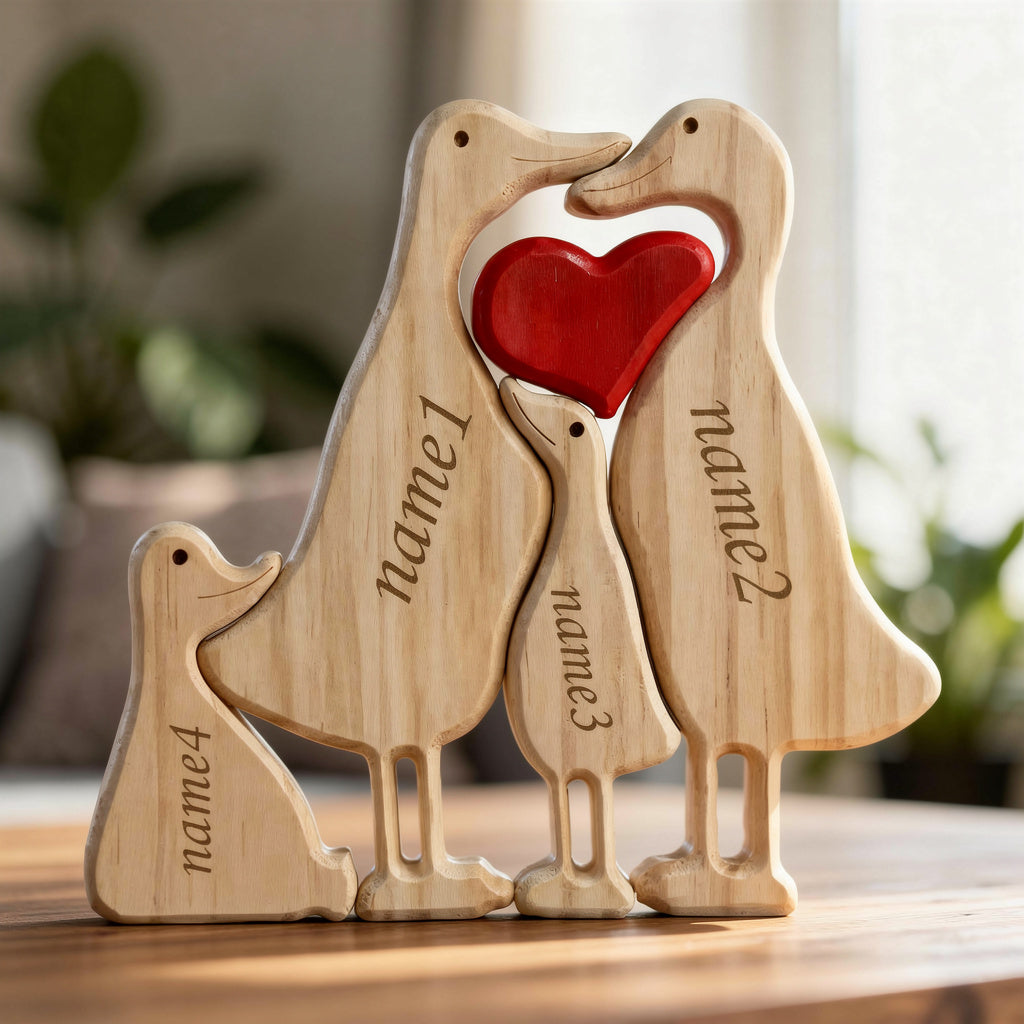 Wooden duck family puzzle four piece set in premium pine wood on a wooden surface.