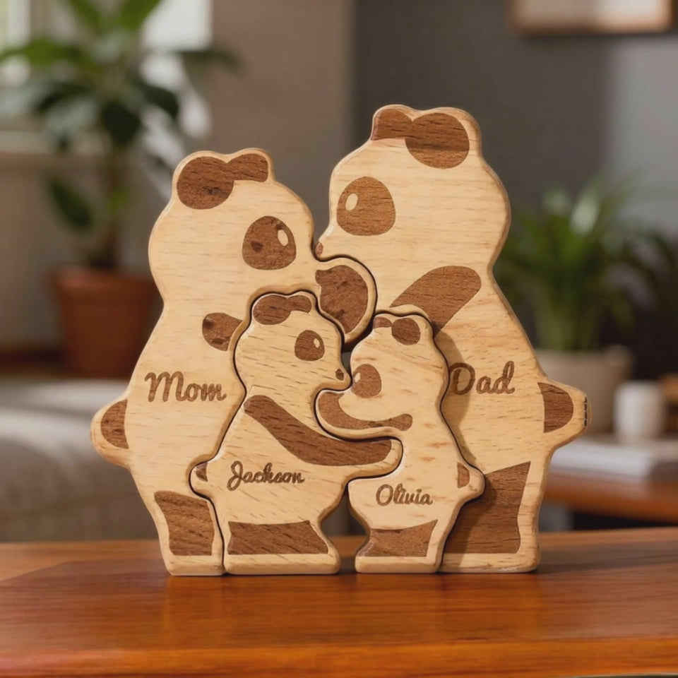 Video of a wooden panda family showing a four person family in with engraved names and personalisation perfect for a gift.