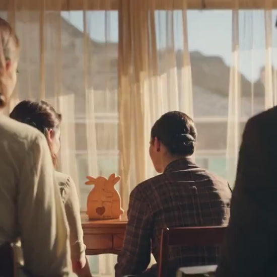 Bunny family keepsake displayed in nursery as baby shower gift decor