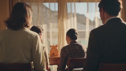 Bunny family keepsake displayed in nursery as baby shower gift decor