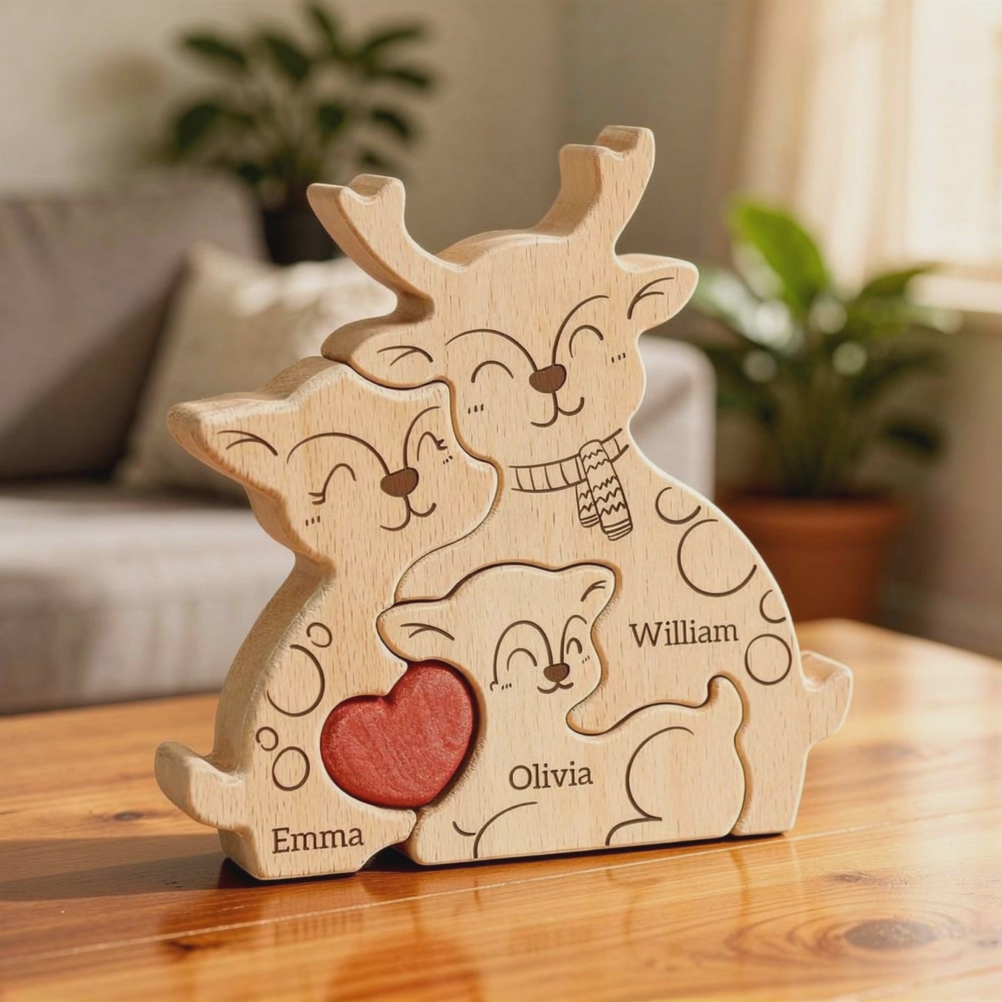 Handmade deer family keepsake for trio of family members with engraving
on a wooden surface