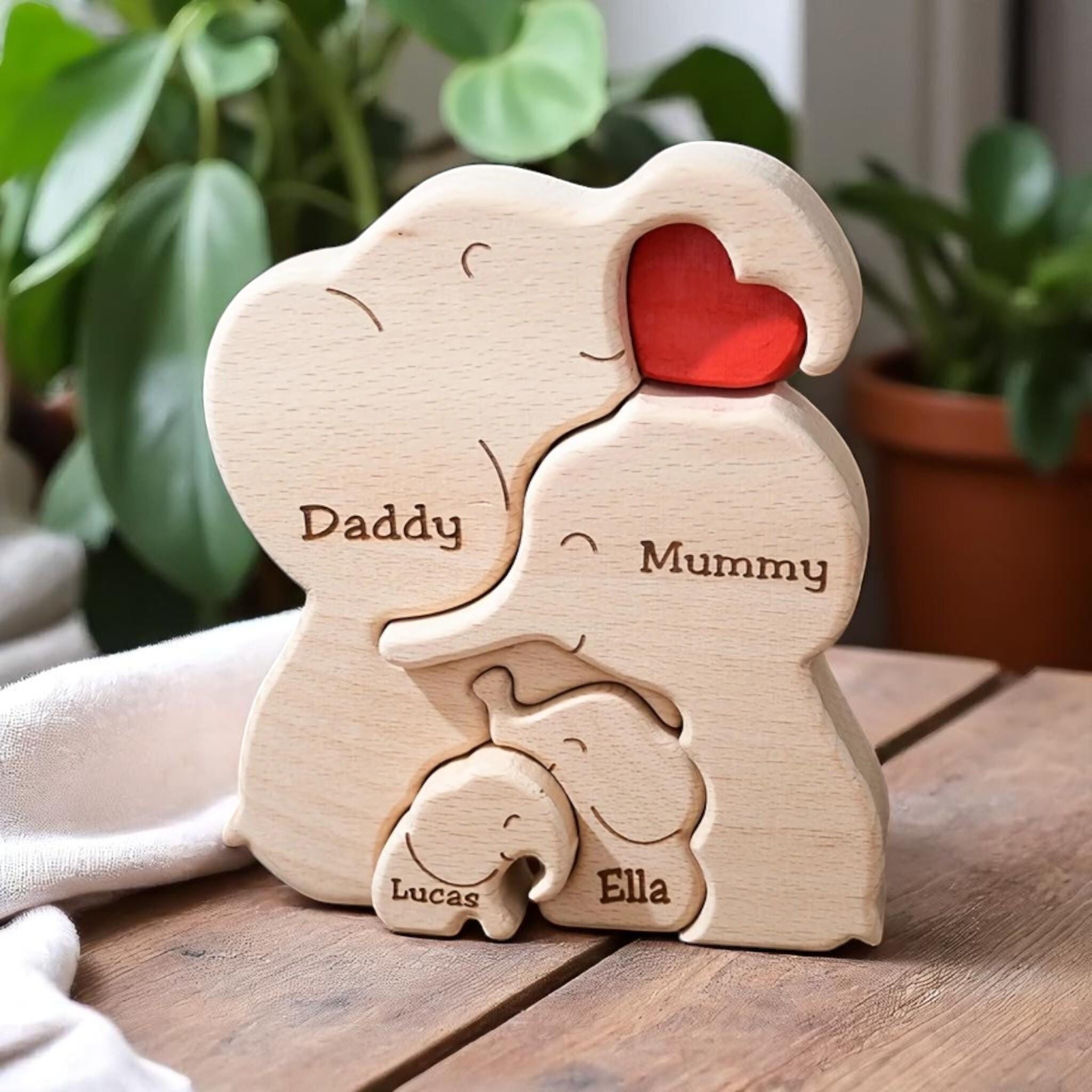 Personalised elephant family wooden puzzle for 4 people with custom engraved names