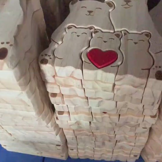Video of personalized wooden koala family figurine with custom engraved names and heart detail, a meaningful family gift and keepsake for parents, children, anniversaries, and home décor. For a family of 4.