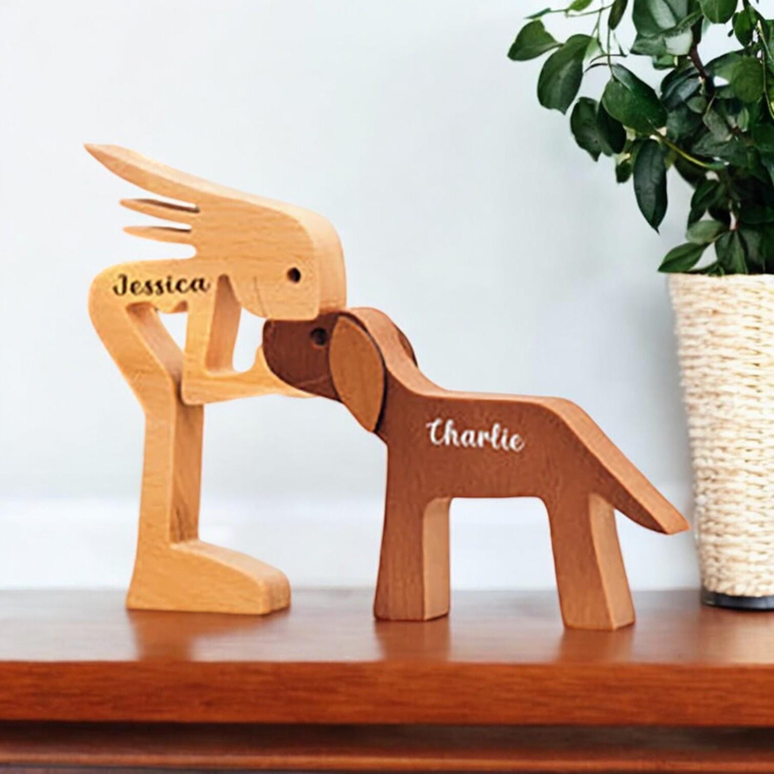 Premium pine wood woman and dog figurine showing handcrafted detail